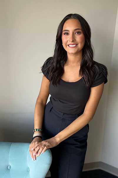 Professional headshot of Clarissa Dominguez, Clara bilingual therapist